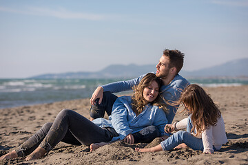 Image showing Young family enjoying vecation during autumn