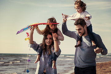 Image showing happy family enjoying vecation during autumn day