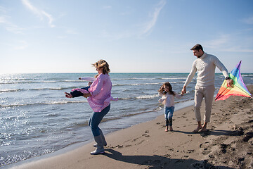 Image showing happy family enjoying vecation during autumn day