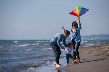 Image showing happy family enjoying vecation during autumn day