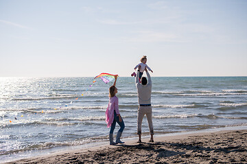 Image showing happy family enjoying vecation during autumn day