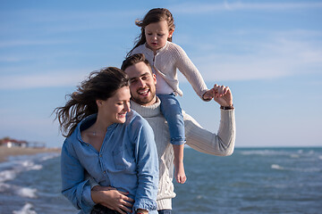 Image showing Young family enjoying vecation during autumn