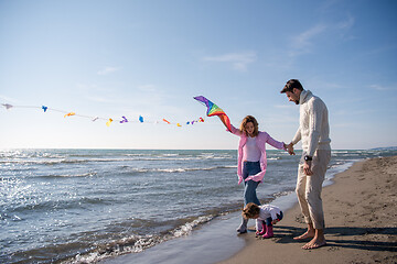 Image showing happy family enjoying vecation during autumn day