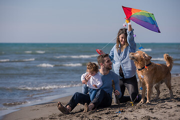 Image showing happy young family enjoying vecation during autumn day