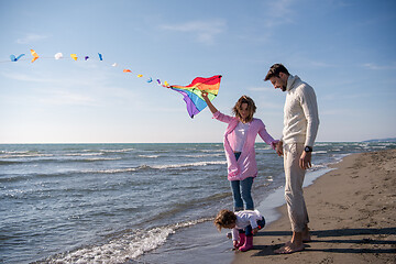 Image showing happy family enjoying vecation during autumn day