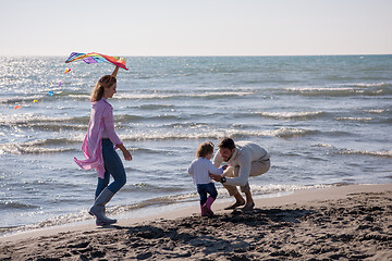 Image showing happy family enjoying vecation during autumn day