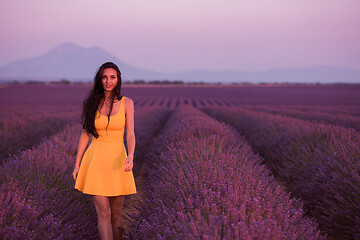 Image showing woman in yellow dress at lavender field