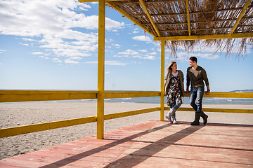 Image showing Couple chating and having fun at beach bar