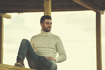 Image showing Young man enjoying the warm autumn day