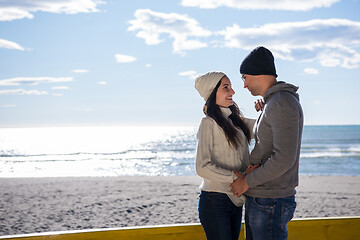 Image showing Couple chating and having fun at beach bar