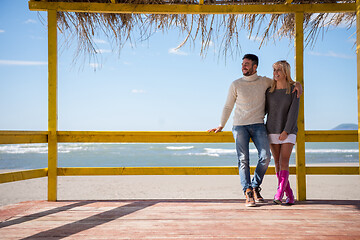 Image showing Couple chating and having fun at beach bar