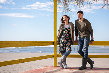 Image showing Couple chating and having fun at beach bar