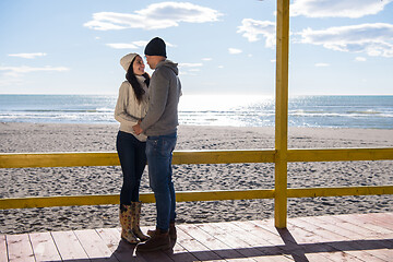 Image showing Couple chating and having fun at beach bar