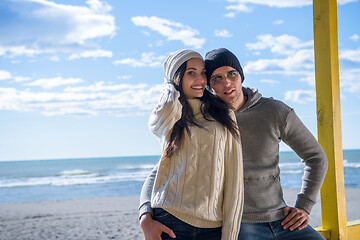 Image showing Couple chating and having fun at beach bar