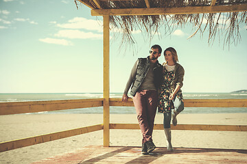 Image showing Couple chating and having fun at beach bar