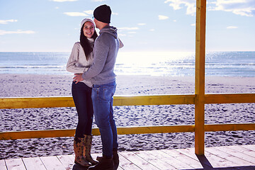 Image showing Couple chating and having fun at beach bar