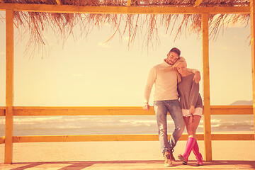 Image showing Couple chating and having fun at beach bar