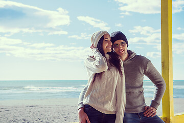 Image showing Couple chating and having fun at beach bar