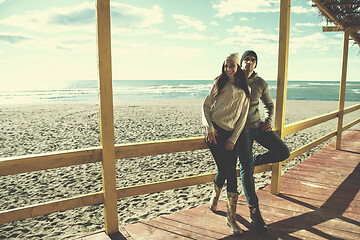 Image showing Couple chating and having fun at beach bar