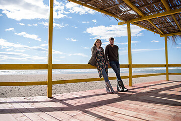 Image showing Couple chating and having fun at beach bar