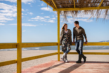 Image showing Couple chating and having fun at beach bar