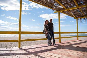 Image showing Couple chating and having fun at beach bar