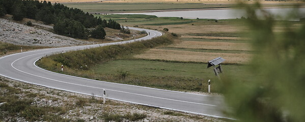 Image showing triathlon athlete riding bike