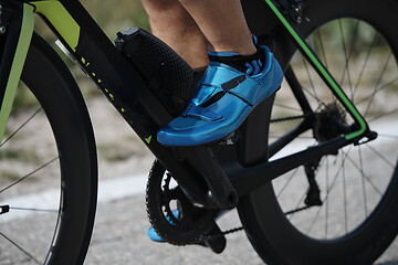 Image showing closeup of triathlon athlete riding bike