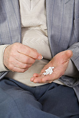 Image showing Taking medication