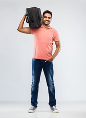 Image showing smiling indian man with travel bag on shouder