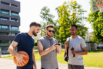 Image showing men with smartphone at basketball playground