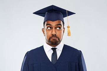 Image showing confused indian graduate student in mortar board