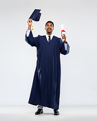 Image showing male graduate student in mortar board with diploma