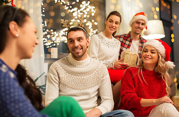 Image showing friends celebrating christmas at home party