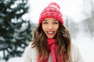 Image showing smiling teenage girl outdoors in winter