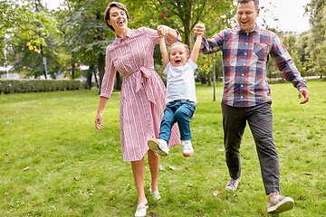 Image showing happy family having fun at summer park