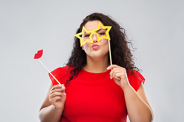 Image showing funny woman with star shaped glasses and red lips