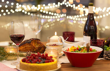 Image showing food and drinks on christmas table at home