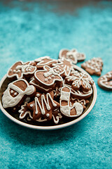 Image showing Delicious fresh Christmas decorated gingerbread cookies placed in wooden crate