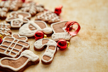 Image showing Christmas cookies compostion on table. With small balls.