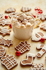 Image showing Cup of hot chocolate and Christmas shaped gingerbread cookies