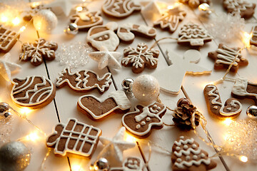 Image showing Christmas sweets composition. Gingerbread cookies with xmas decorations