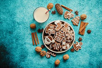 Image showing Sweet Christmas composition. Assortment of gingerbread cookies on a plate