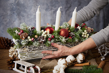 Image showing Beautiful Christmas basket with candles