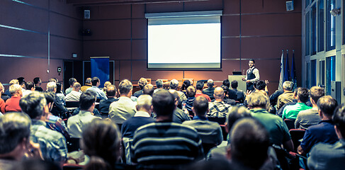 Image showing Business speaker giving a talk at business conference meeting event.