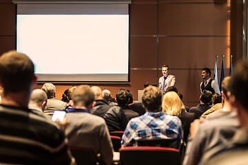 Image showing Business speaker giving a talk at business conference meeting event.