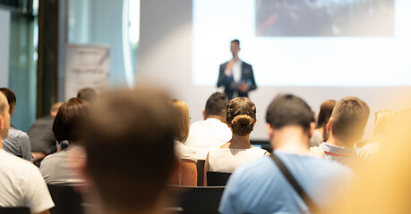 Image showing Male business speaker giving a talk at business conference event.