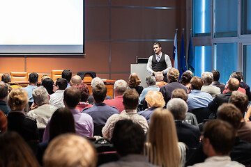 Image showing Business speaker giving a talk at business conference meeting event.