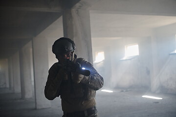 Image showing modern warfare soldier in urban environment battlefield