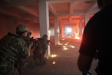 Image showing military troops in action urban environment